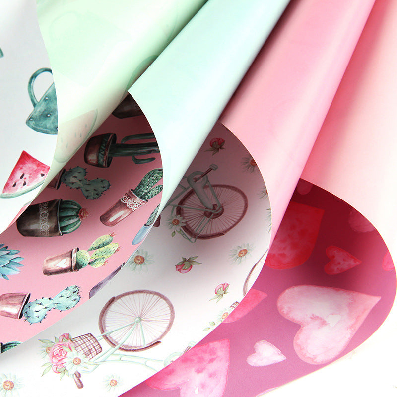 Coated gift wrapping paper