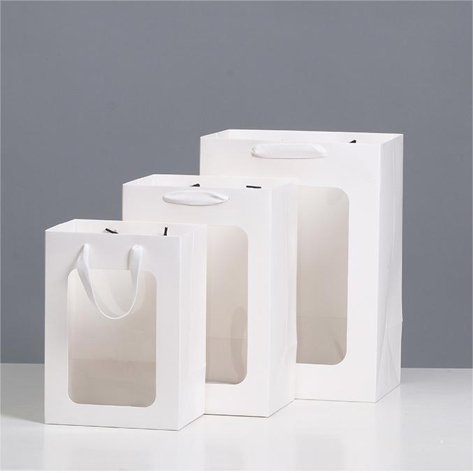 Clear paper bag with handle