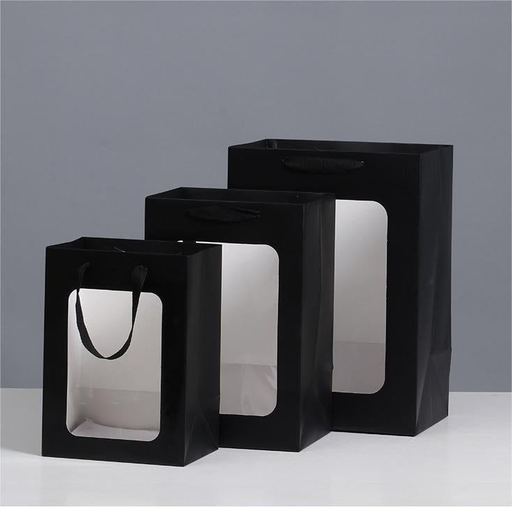 Clear paper bag with handle